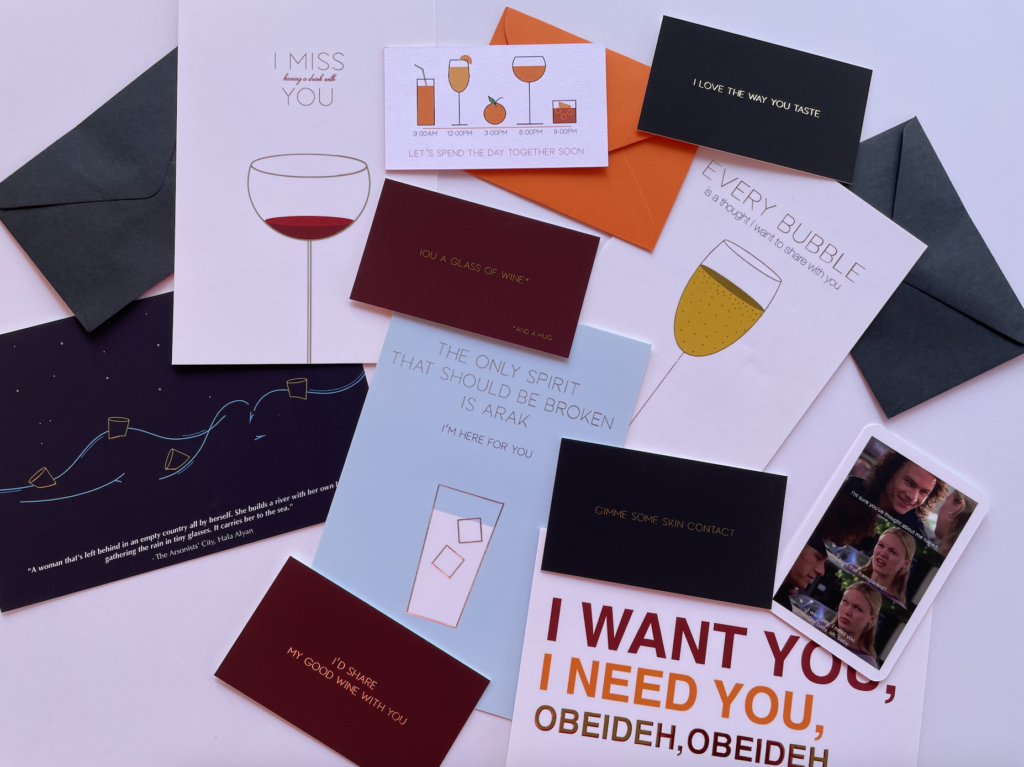 Selection of wine-themed cards, fanned out.